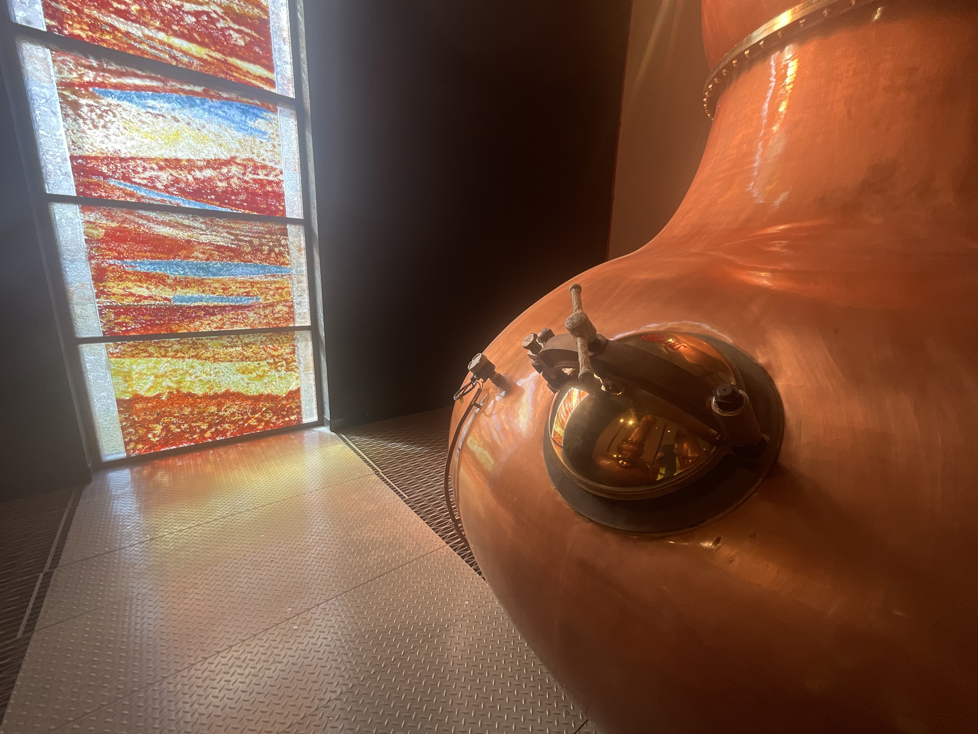 the window in relation to one if the stills