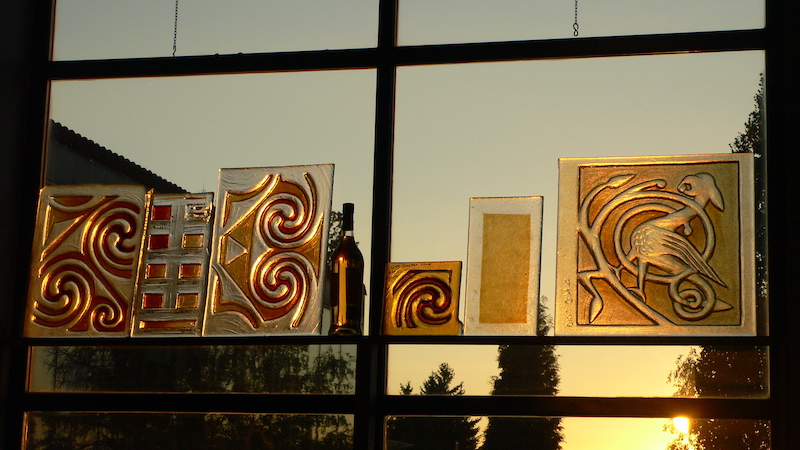 Glenmorangie window detail — Pictish spiral in amber fused glass