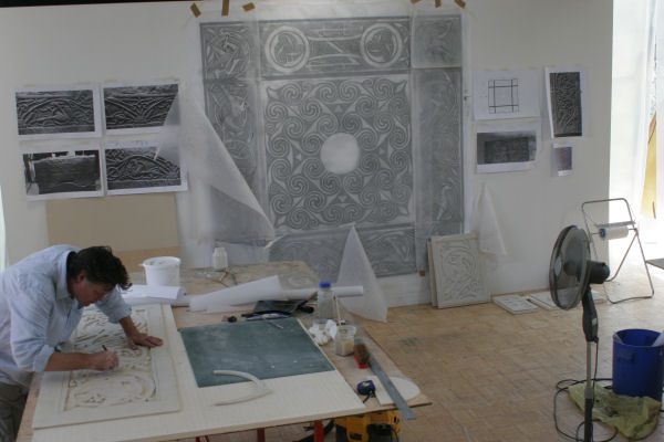 The large centre panel form completed — Pictish spiral pattern resolved in carbon fibre board