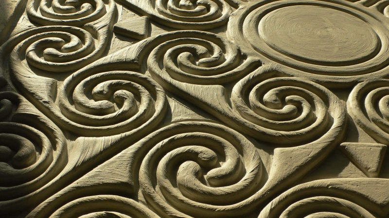 The large centre panel form completed — Pictish spiral pattern resolved in carbon fibre board