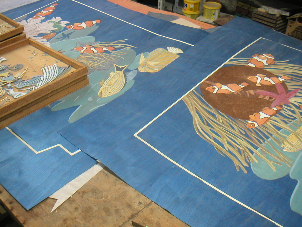 The panels laid out on the workshop floor — scale visible