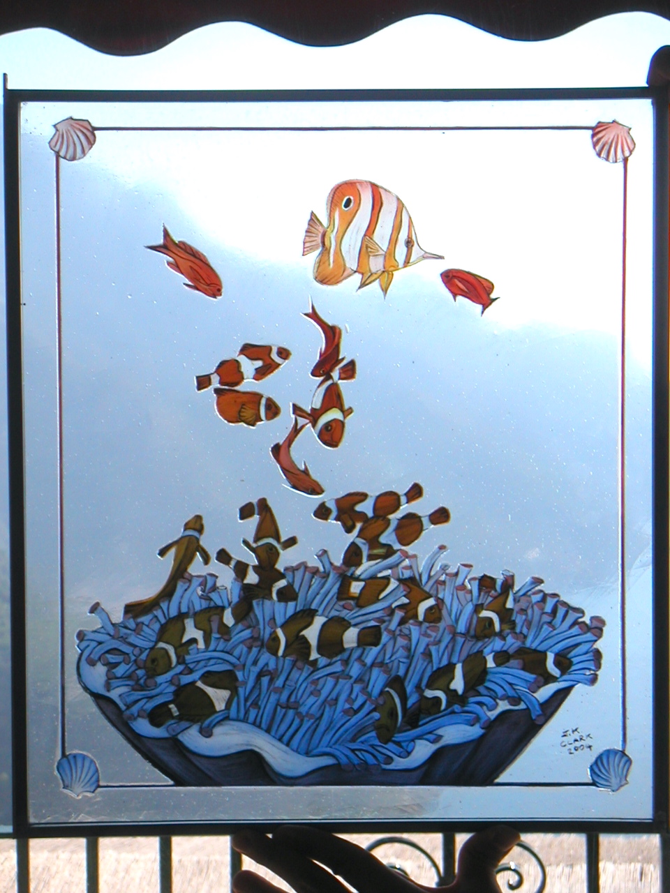Painted glass panel — clownfish and sea anemone colony on a single sheet of glass, J.K. Clark 2004