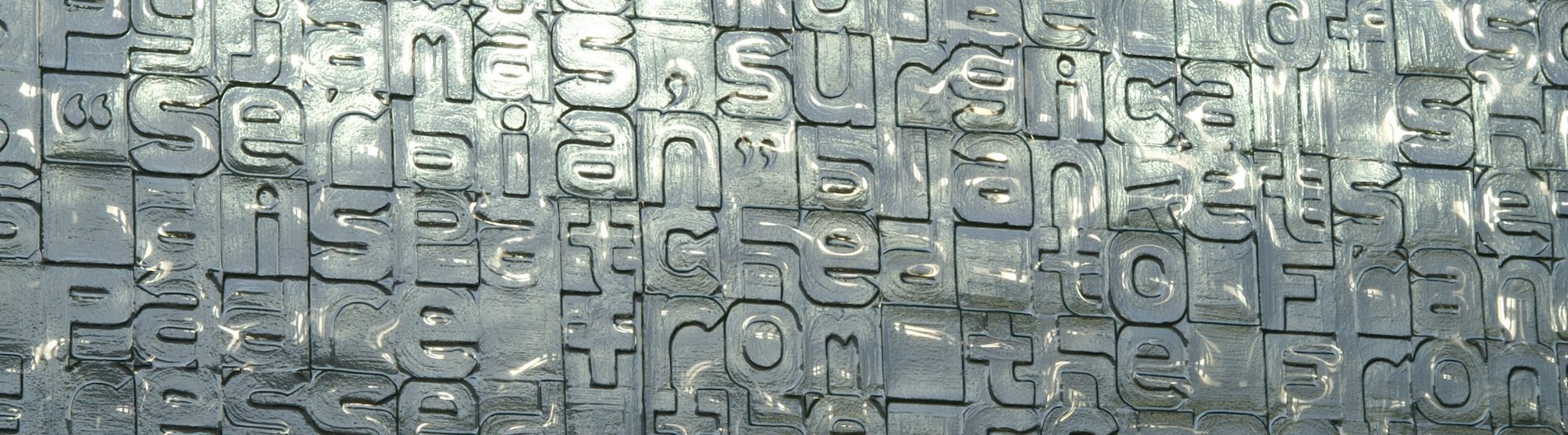 Dalmore Stillhouse Window - Section of the 10-metre fused glass artwork with copper stills in the background
